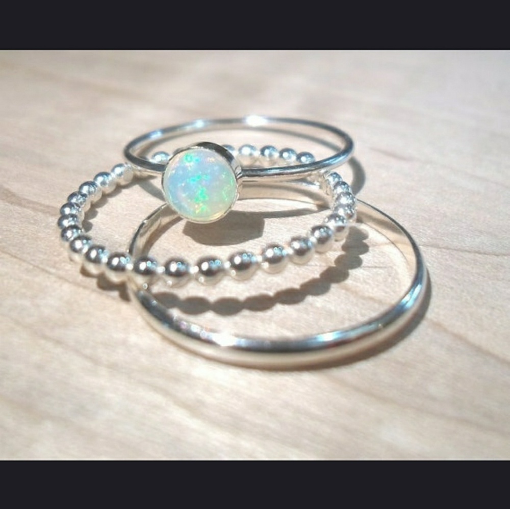 Three piece rolling sparkle opal gemstone ring